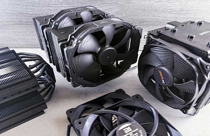 Close-up view of air coolers for PCs showing different CPU cooler models for air cooler vs liquid cooler cpu comparison